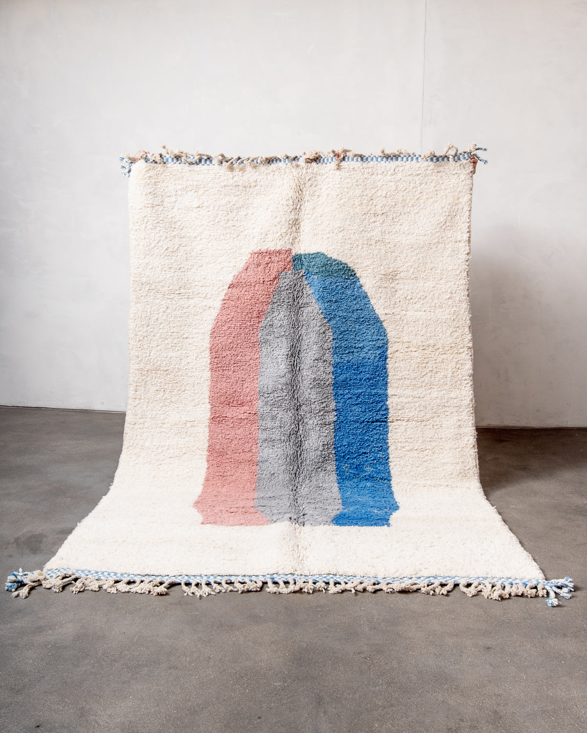 Modern, designer, handcrafted Berber rug from Morocco. Beniourain carpet with beautiful colours and patterns and fluffy wool texture.